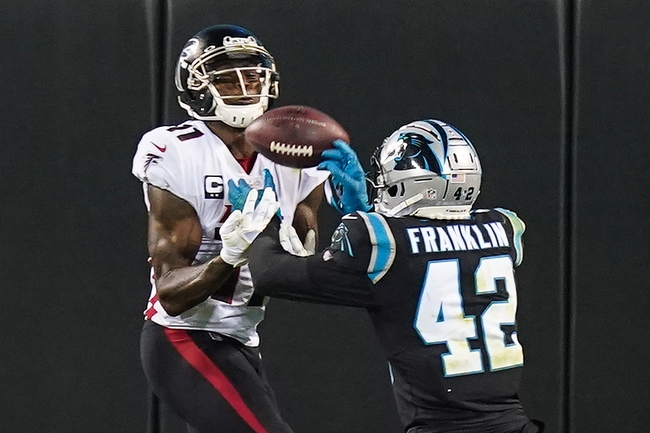 Oct 29, 2020; Charlotte, North Carolina, USA;  Carolina Panthers safety Sam Franklin (42) breaks up a pass to Atlanta Falcons wide receiver Julio Jones (11) during the second quarter at Bank of America Stadium. Mandatory Credit: Jim Dedmon-USA TODAY Sports