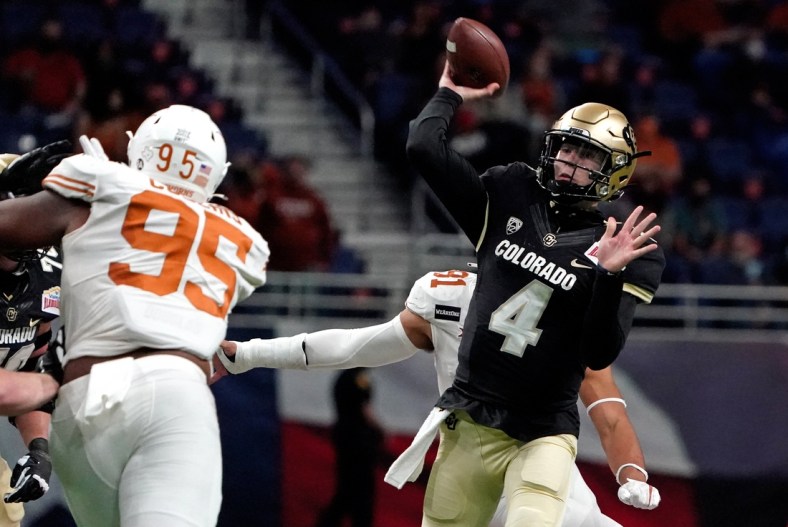 Dec 29, 2020; San Antonio, TX, USA; Colorado Buffaloes quarterback Sam Noyer (4) throws a pass against the Texas Longhorns during the first half at Alamodome. Mandatory Credit: Kirby Lee-USA TODAY Sports