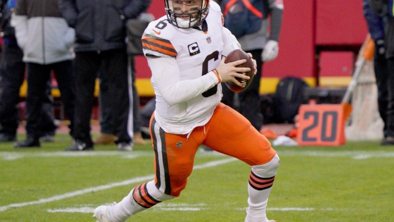 Jan 17, 2021; Kansas City, Missouri, USA; Cleveland Browns quarterback Baker Mayfield (6) drops back to pass during the AFC Divisional Round playoff game against the Kansas City Chiefs at Arrowhead Stadium. Mandatory Credit: Denny Medley-USA TODAY Sports