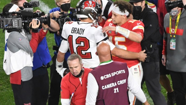 Feb 7, 2021; Tampa, FL, USA; Tampa Bay Buccaneers quarterback Tom Brady (12) greets Kansas City Chiefs quarterback Patrick Mahomes (15) after Super Bowl LV at Raymond James Stadium.  Mandatory Credit: James Lang-USA TODAY Sports