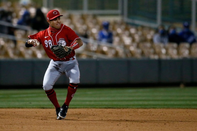 Cincinnati Reds third baseman Alejo Lopez (98) fields a ground ball off the bat of Miguel Vargas in the sixth inning of the MLB Cactus League Spring Training game between the Los Angeles Dodgers and the Cincinnati Reds at Camelback Ranch in Glendale, Ariz., on Wednesday, March 3, 2021. The seven inning game ended in a 4-4 tie.

Cincinnati Reds At Los Angeles Dodgers Spring Training