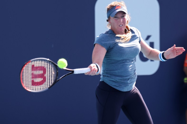 Mar 23, 2021; Miami, Florida, USA; Madison Brengle of the United States hits a forehand against Shelby Rogers of the United States (not pictured) in the first round of the Miami Open at Hard Rock Stadium. Mandatory Credit: Geoff Burke-USA TODAY Sports