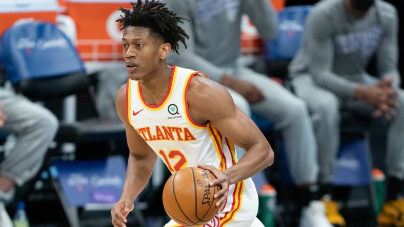 March 24, 2021; Sacramento, California, USA; Atlanta Hawks forward De'Andre Hunter (12) during the first quarter against the Sacramento Kings at Golden 1 Center. Mandatory Credit: Kyle Terada-USA TODAY Sports