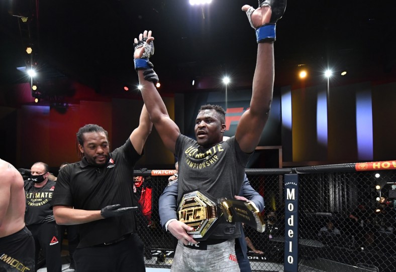 Mar 27, 2021; Las Vegas, NV, USA;  Francis Ngannou of Cameroon reacts after his victory over Stipe Miocic in their UFC heavyweight championship fight during the UFC 260 event at UFC APEX on March 27, 2021 in Las Vegas, Nevada.   Mandatory Credit: Jeff Bottari/Handout Photo via USA TODAY Sports