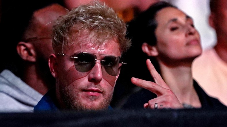 Apr 24, 2021; Jacksonville, Florida, USA; YouTube start Jake Paul looks on before Anthony Smith (Red Gloves) fights Jimmy Crute (Blue Gloves) during UFC 261 at VyStar Veterans Memorial Arena. Mandatory Credit: Jasen Vinlove-USA TODAY Sports