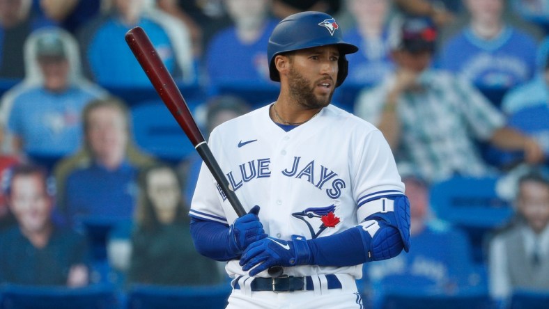 Apr 28, 2021; Dunedin, Florida, CAN;  Toronto Blue Jays designated hitter George Springer (4) at bat  in the first inning against the Washington Nationals at TD Ballpark. Mandatory Credit: Nathan Ray Seebeck-USA TODAY Sports