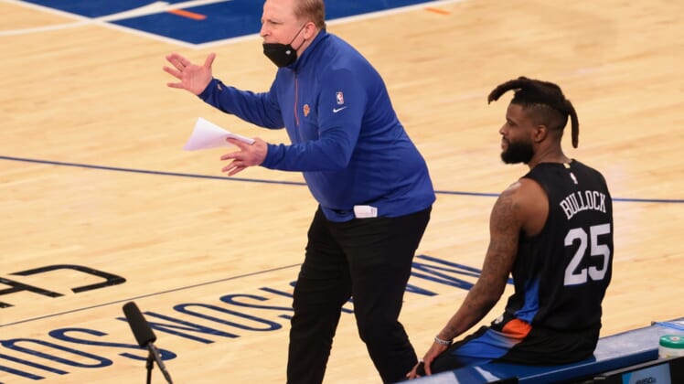Apr 28, 2021; New York, New York, USA; New York Knicks head coach Tom Thibodeau  reacts during the second quarter against the Chicago Bulls in front of forward Reggie Bullock (25) at Madison Square Garden. Mandatory Credit: Vincent Carchietta-USA TODAY Sports