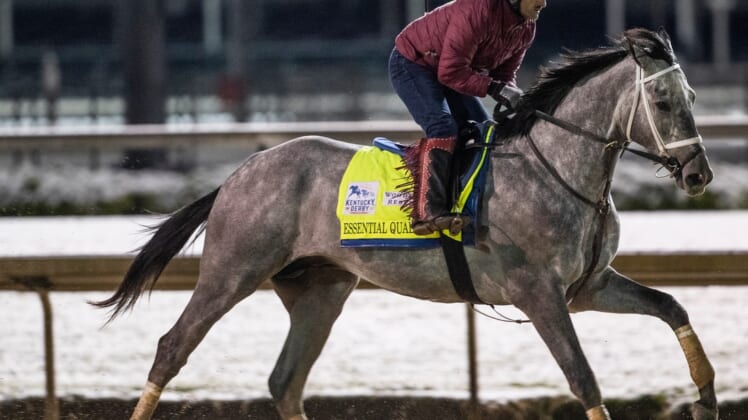 Kentucky Derby favorite Essential Quality gallops before dawn on the track at Churchill Downs. April 21, 2021Af5i6154