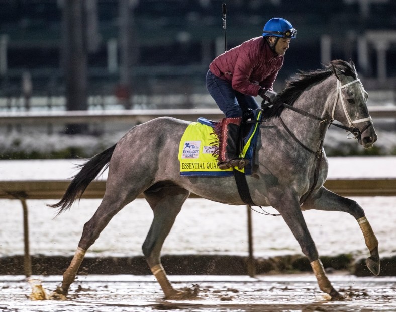 Kentucky Derby favorite Essential Quality gallops before dawn on the track at Churchill Downs. April 21, 2021

Af5i6154