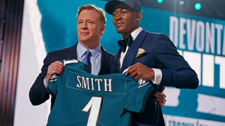 Apr 29, 2021; Cleveland, Ohio, USA; DeVonta Smith (Alabama) with NFL commissioner Roger Goodell after being selected by Philadelphia Eagles as the number ten overall pick in the first round of the 2021 NFL Draft at First Energy Stadium. Mandatory Credit: Kirby Lee-USA TODAY Sports