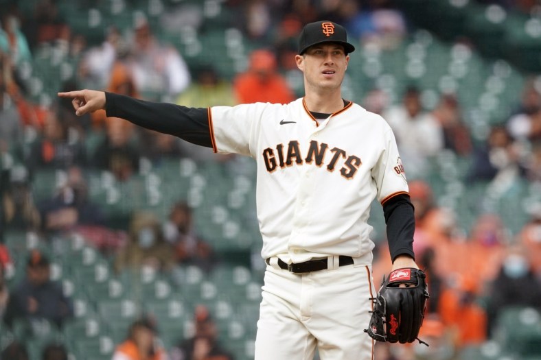 Apr 25, 2021; San Francisco, California, USA; San Francisco Giants relief pitcher Matt Wisler (37) gestures during the eighth inning against the Miami Marlins at Oracle Park. Mandatory Credit: Darren Yamashita-USA TODAY Sports