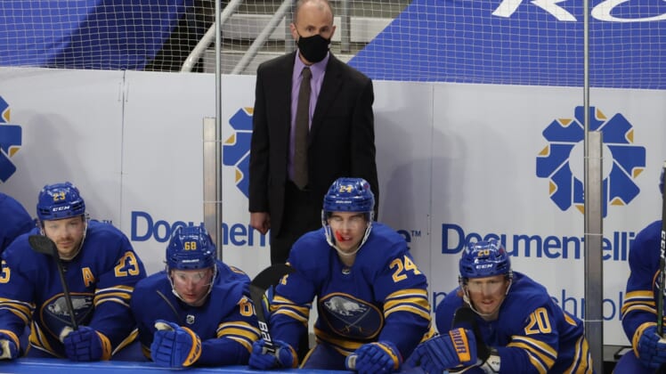 May 3, 2021; Buffalo, New York, USA;  Buffalo Sabres head coach Don Granato watches his team from the bench during the second period against the New York Islanders at KeyBank Center. Mandatory Credit: Timothy T. Ludwig-USA TODAY Sports