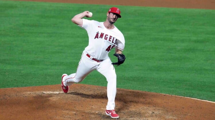 May 3, 2021; Anaheim, California, USA; Los Angeles Angels pitcher James Hoyt (49) delivers a pitch in the fourth inning against the Tampa Bay Rays  at Angel Stadium. Mandatory Credit: Kirby Lee-USA TODAY Sports