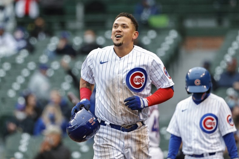May 4, 2021; Chicago, Illinois, USA; Chicago Cubs second baseman Ildemaro Vargas (16) smiles after scoring against the Los Angeles Dodgers during the third inning of the first game of a doubleheader at Wrigley Field. Mandatory Credit: Kamil Krzaczynski-USA TODAY Sports