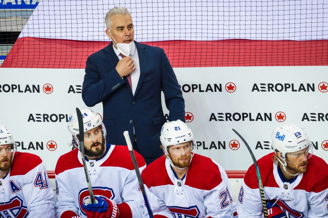 Apr 23, 2021; Calgary, Alberta, CAN; Montreal Canadiens head coach Dominique Ducharme on his bench against the Calgary Flames during the second period at Scotiabank Saddledome. Mandatory Credit: Sergei Belski-USA TODAY Sports