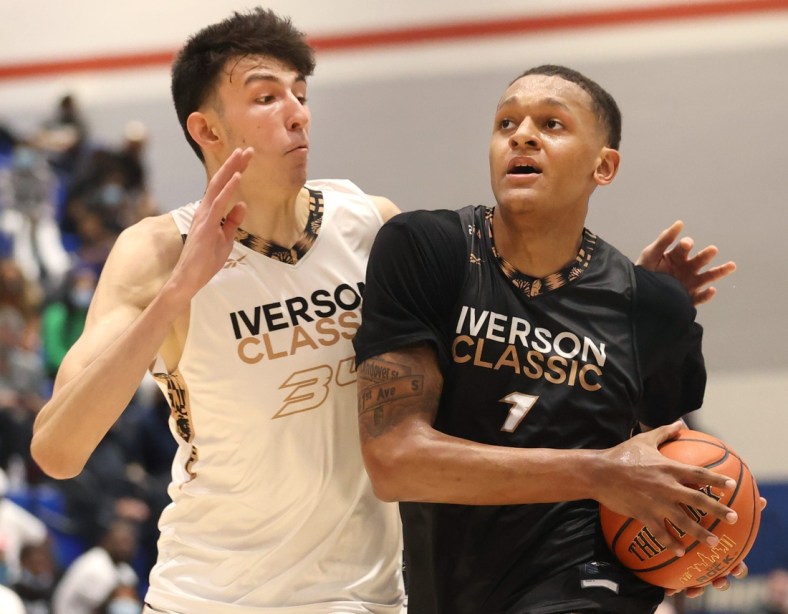 Chet Holmgren defends Paolo Banchero on a drive during the Iverson Classic All-American Game at Bartlett High School on Saturday, May 8, 2021.

A37i5072