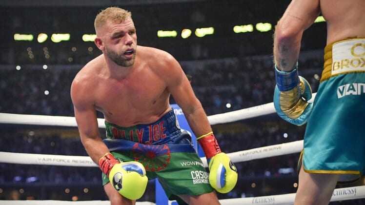 May 8, 2021; Arlington, Texas, USA; Boxer Billy Joe Saunders suffers a quadripod fracture to his orbital bone on a punch from Canelo Alvarez and loses on a technical knockout during a super middleweight boxing title fight at AT&T Stadium. Mandatory Credit: Jerome Miron-USA TODAY Sports