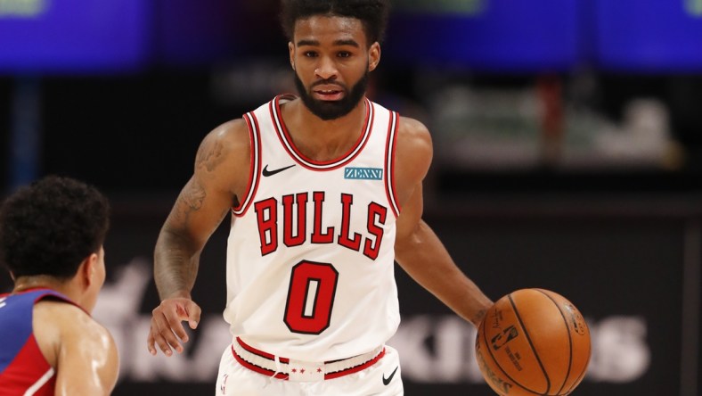 May 9, 2021; Detroit, Michigan, USA; Chicago Bulls guard Coby White (0) dribbles the ball against Detroit Pistons guard Killian Hayes (7) during the fourth quarter at Little Caesars Arena. Mandatory Credit: Raj Mehta-USA TODAY Sports