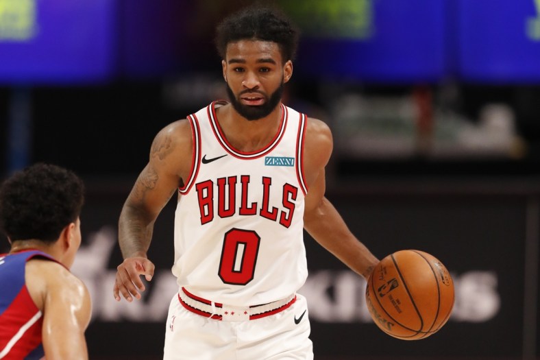 May 9, 2021; Detroit, Michigan, USA; Chicago Bulls guard Coby White (0) dribbles the ball against Detroit Pistons guard Killian Hayes (7) during the fourth quarter at Little Caesars Arena. Mandatory Credit: Raj Mehta-USA TODAY Sports