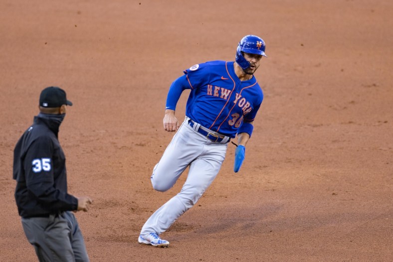 May 1, 2021; Philadelphia, Pennsylvania, USA; New York Mets right fielder Michael Conforto (30) advances to third base against the Philadelphia Phillies in the first inning at Citizens Bank Park. Mandatory Credit: Kam Nedd-USA TODAY Sports