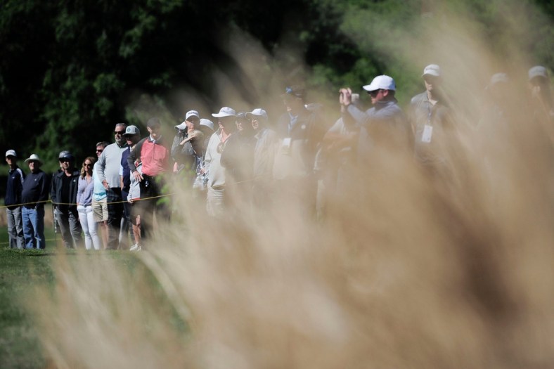 Spectators watch as a grouping competes at the 2021 Visit Knoxville Open PGA Korn Ferry Tour at Holston Hills Country Club in Knoxville, Tenn. on Thursday, May 13, 2021. The competition runs through Sunday. Single-day tickets are available for $10.

Kns 2021 Visit Knoxville Open