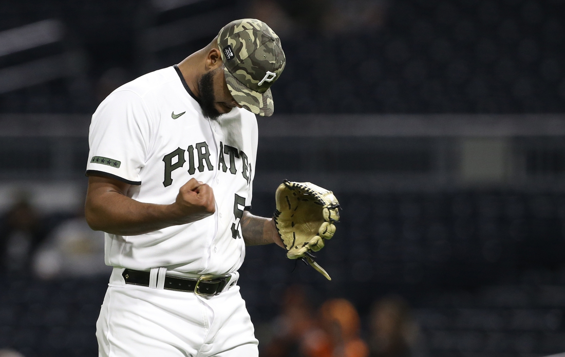 May 14, 2021; Pittsburgh, Pennsylvania, USA; Pittsburgh Pirates relief pitcher Luis Oviedo (57) reacts after pitching the eleventh inning against the San Francisco Giants at PNC Park. The Pirates won 3-2 in eleven innings. Mandatory Credit: Charles LeClaire-USA TODAY Sports