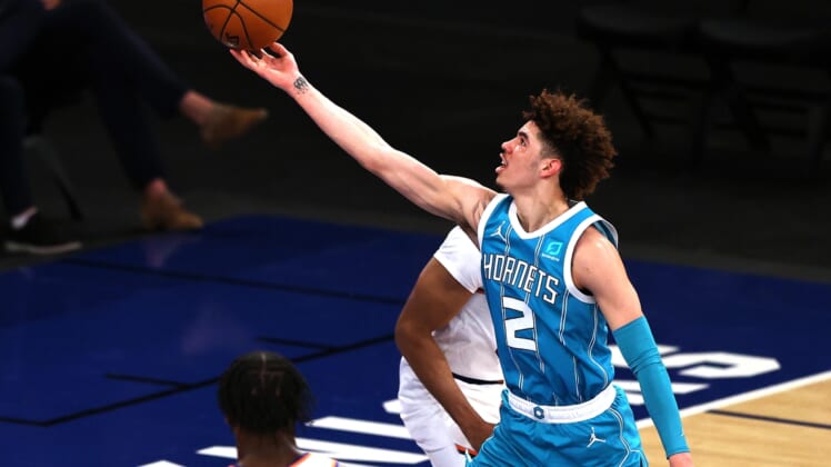 May 15, 2021; New York, New York, USA;   LaMelo Ball #2 of the Charlotte Hornets heads for the net in the second quarter at Madison Square Garden on May 15, 2021 in New York City. Mandatory Credit: Elsa/Pool Photo-USA TODAY Sports