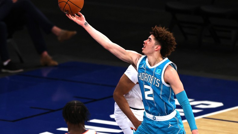 May 15, 2021; New York, New York, USA;   LaMelo Ball #2 of the Charlotte Hornets heads for the net in the second quarter at Madison Square Garden on May 15, 2021 in New York City. Mandatory Credit: Elsa/Pool Photo-USA TODAY Sports