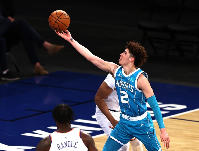May 15, 2021; New York, New York, USA;   LaMelo Ball #2 of the Charlotte Hornets heads for the net in the second quarter at Madison Square Garden on May 15, 2021 in New York City. Mandatory Credit: Elsa/Pool Photo-USA TODAY Sports
