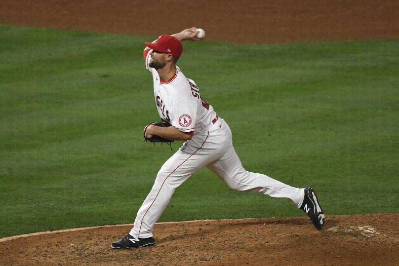 May 17, 2021; Anaheim, California, USA; Los Angeles Angels relief pitcher Hunter Strickland (60) delivers a pitch against the Cleveland Indians during the sixth inning at Angel Stadium. Mandatory Credit: Richard Mackson-USA TODAY Sports