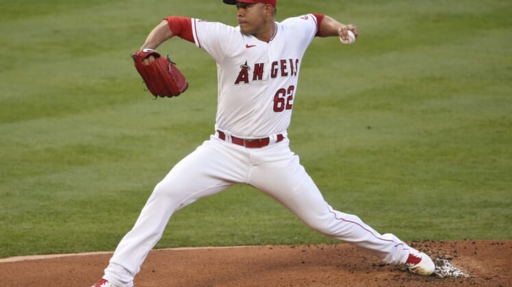 May 21, 2021; Anaheim, California, USA; Los Angeles Angels starting pitcher Jose Quintana (62) delivers a pitch during the first inning against the Oakland Athletics at Angel Stadium. Mandatory Credit: Kelvin Kuo-USA TODAY Sports