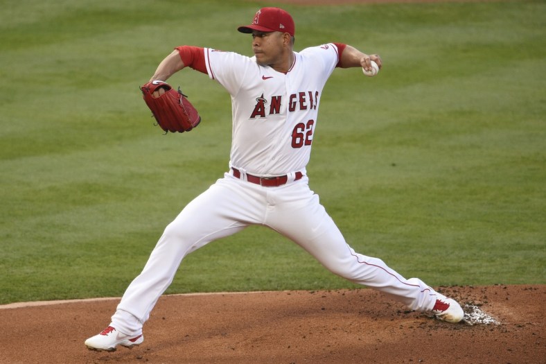 May 21, 2021; Anaheim, California, USA; Los Angeles Angels starting pitcher Jose Quintana (62) delivers a pitch during the first inning against the Oakland Athletics at Angel Stadium. Mandatory Credit: Kelvin Kuo-USA TODAY Sports