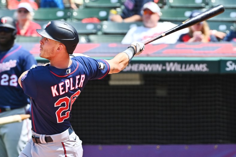 May 23, 2021; Cleveland, Ohio, USA; Minnesota Twins right fielder Max Kepler (26) hits a home run during the fourth inning against the Cleveland Indians at Progressive Field. Mandatory Credit: Ken Blaze-USA TODAY Sports