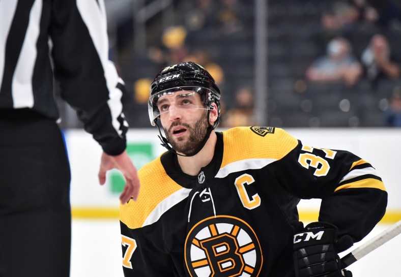 May 21, 2021; Boston, Massachusetts, USA; Boston Bruins center Patrice Bergeron (37) during the second period in game four of the first round of the 2021 Stanley Cup Playoffs against the Washington Capitals at TD Garden. Mandatory Credit: Bob DeChiara-USA TODAY Sports