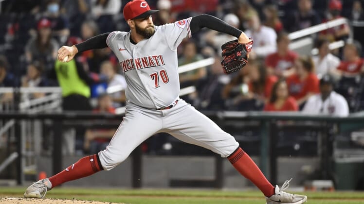 May 25, 2021; Washington, District of Columbia, USA; Cincinnati Reds relief pitcher Tejay Antone (70) throws to the Washington Nationals during the seventh inning at Nationals Park. Mandatory Credit: Brad Mills-USA TODAY Sports