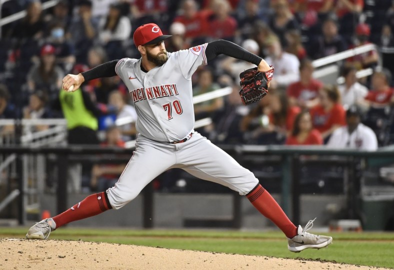 May 25, 2021; Washington, District of Columbia, USA; Cincinnati Reds relief pitcher Tejay Antone (70) throws to the Washington Nationals during the seventh inning at Nationals Park. Mandatory Credit: Brad Mills-USA TODAY Sports