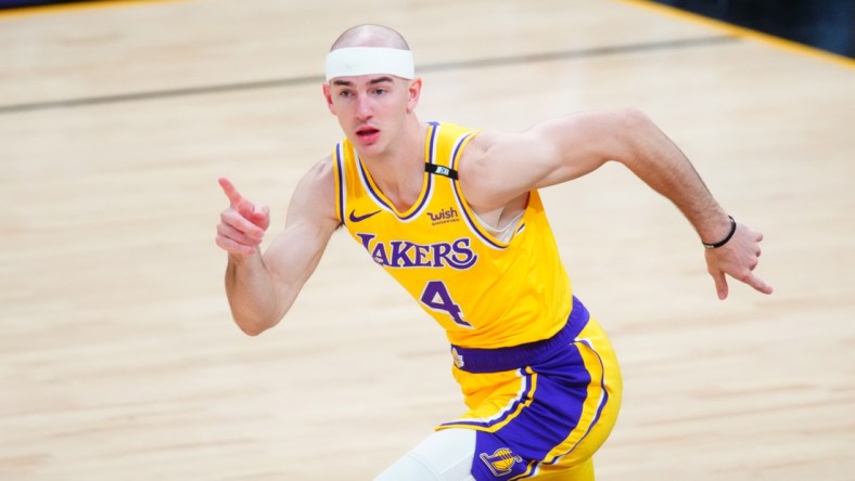 May 25, 2021; Phoenix, Arizona, USA; Los Angeles Lakers guard Alex Caruso (4) reacts against the Phoenix Suns during game two of the first round of the 2021 NBA Playoffs at Phoenix Suns Arena. Mandatory Credit: Mark J. Rebilas-USA TODAY Sports