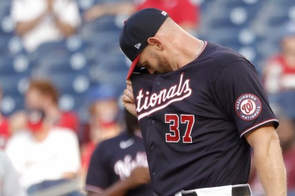 May 27, 2021; Washington, District of Columbia, USA; Washington Nationals starting pitcher Stephen Strasburg (37) wipes his face between batters against the Cincinnati Reds in the first inning at Nationals Park. Mandatory Credit: Geoff Burke-USA TODAY Sports