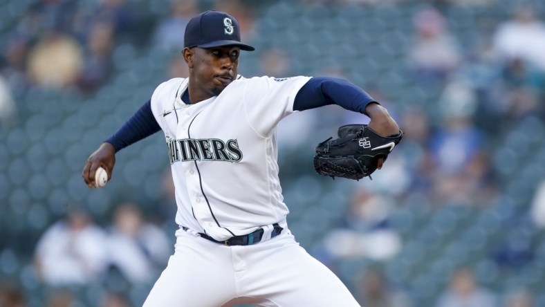 May 29, 2021; Seattle, Washington, USA; Seattle Mariners starting pitcher Justin Dunn (35) throws against the Texas Rangers during the first inning at T-Mobile Park. Mandatory Credit: Joe Nicholson-USA TODAY Sports