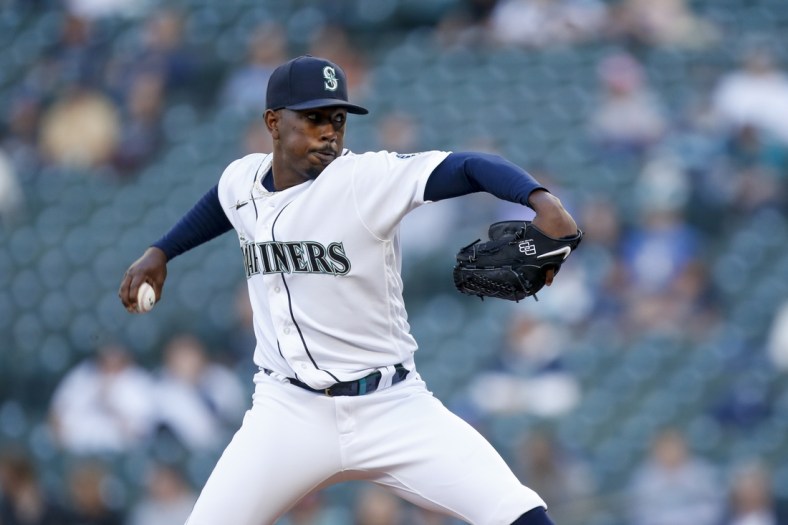May 29, 2021; Seattle, Washington, USA; Seattle Mariners starting pitcher Justin Dunn (35) throws against the Texas Rangers during the first inning at T-Mobile Park. Mandatory Credit: Joe Nicholson-USA TODAY Sports