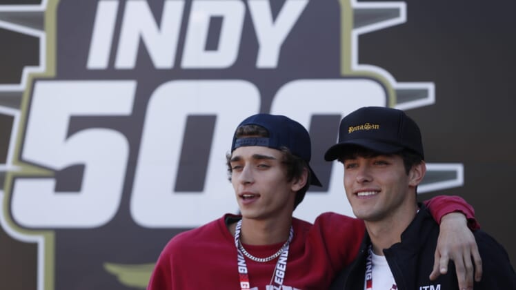 Josh Richards and Griffin Johnson, both part of the Sway Boys, pose for photos Sunday, May 30, 2021, during the 105th running of the Indianapolis 500 at Indianapolis Motor Speedway.