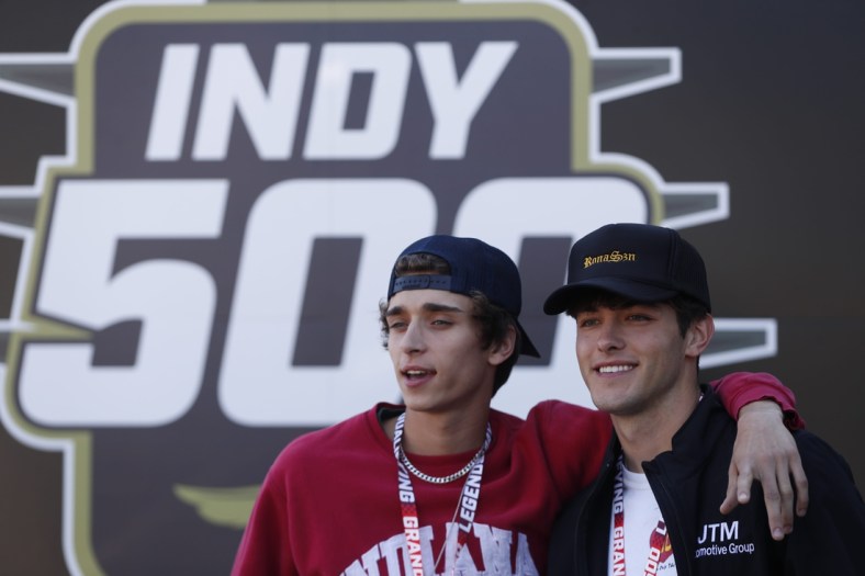Josh Richards and Griffin Johnson, both part of the Sway Boys, pose for photos Sunday, May 30, 2021, during the 105th running of the Indianapolis 500 at Indianapolis Motor Speedway.