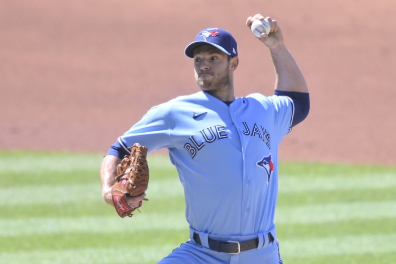 May 30, 2021; Cleveland, Ohio, USA; Toronto Blue Jays starting pitcher Steven Matz (22) delivers a pitch in the first inning against the Cleveland Indians at Progressive Field. Mandatory Credit: David Richard-USA TODAY Sports