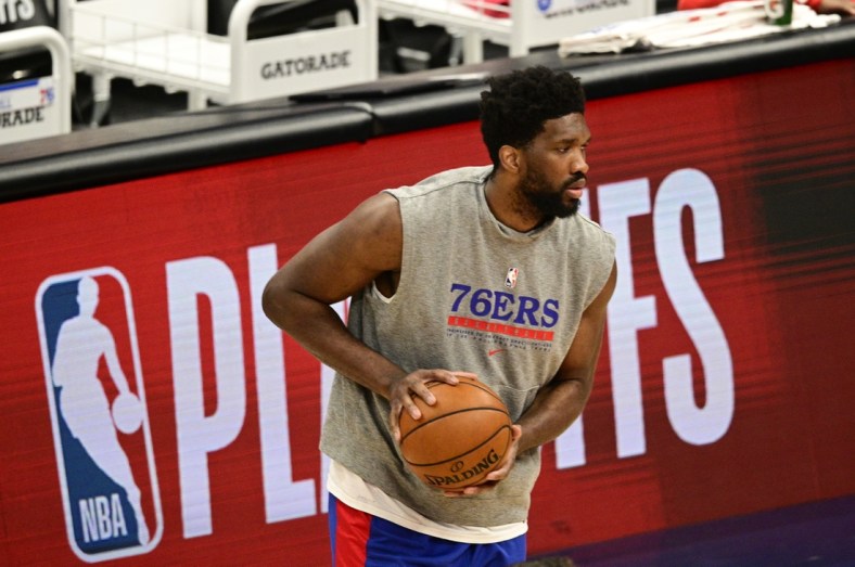 May 31, 2021; Washington, District of Columbia, USA; Philadelphia 76ers center Joel Embiid (21) warms up before the game four against the Washington Wizards in the first round of the 2021 NBA Playoffs. at Capital One Arena. Mandatory Credit: Tommy Gilligan-USA TODAY Sports