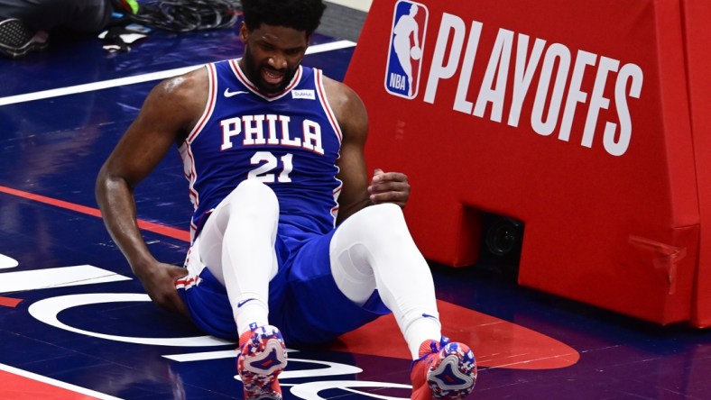 May 31, 2021; Washington, District of Columbia, USA; Philadelphia 76ers center Joel Embiid (21) reacts after a play during game four against the Washington Wizards  in the first round of the 2021 NBA Playoffs. at Capital One Arena. Mandatory Credit: Tommy Gilligan-USA TODAY Sports