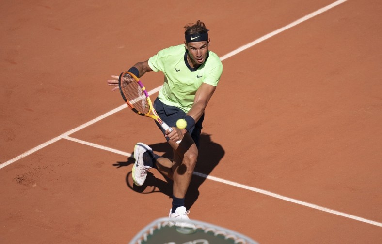 Jun 1, 2021; Paris, France; Rafael Nadal (ESP) in action during his match against Alexei Popyrin (AUS) on day three of the French Open at Roland Garros Stadium. Mandatory Credit: Susan Mullane-USA TODAY Sports
