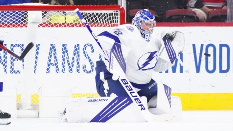 Jun 1, 2021; Raleigh, North Carolina, USA; Tampa Bay Lightning goaltender Andrei Vasilevskiy (88) gets ready to make a glove save against the Carolina Hurricanes in game two of the second round of the 2021 Stanley Cup Playoffs at PNC Arena. Mandatory Credit: James Guillory-USA TODAY Sports