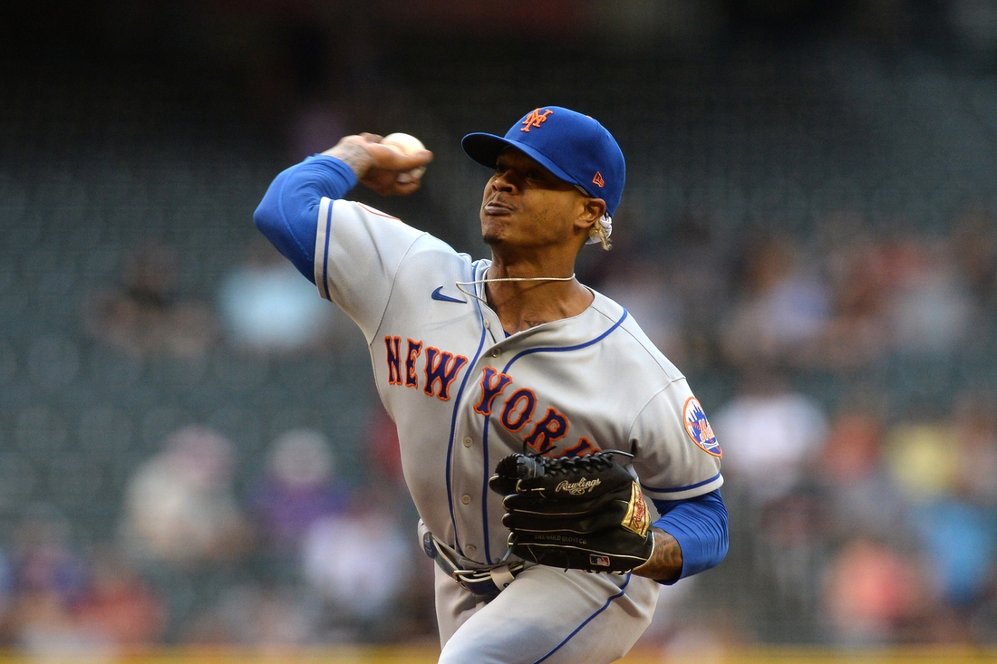 Jun 1, 2021; Phoenix, Arizona, USA; New York Mets starting pitcher Marcus Stroman (0) pitches against the Arizona Diamondbacks during the first inning at Chase Field. Mandatory Credit: Joe Camporeale-USA TODAY Sports