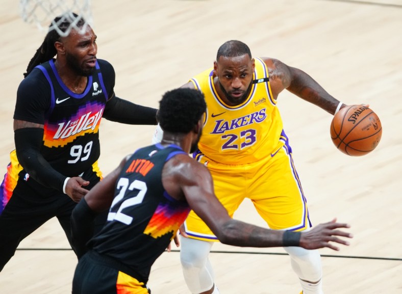 Jun 1, 2021; Phoenix, Arizona, USA; Los Angeles Lakers forward LeBron James (23) drives to the basket against the Phoenix Suns in the first half during game five in the first round of the 2021 NBA Playoffs at Phoenix Suns Arena. Mandatory Credit: Mark J. Rebilas-USA TODAY Sports