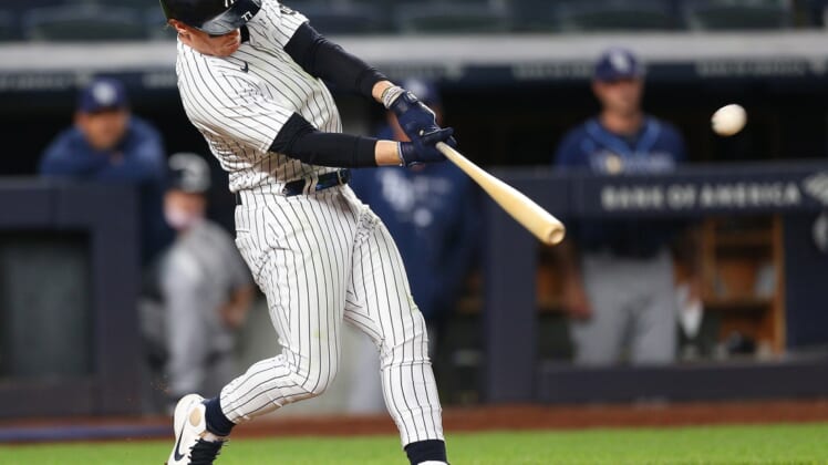 Jun 1, 2021; Bronx, New York, USA; New York Yankees right fielder Clint Frazier (77) hits a walk off game winning two run home run against the Tampa Bay Rays during the eleventh inning at Yankee Stadium. Mandatory Credit: Andy Marlin-USA TODAY Sports
